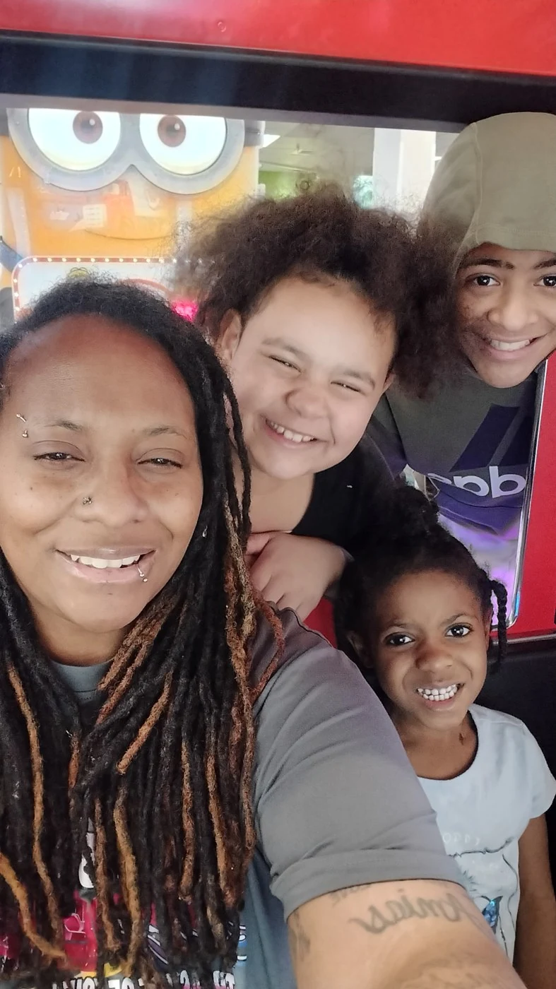 A smiling family enjoying an outing together
